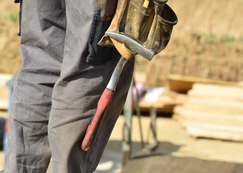 Image of a person wearing tools